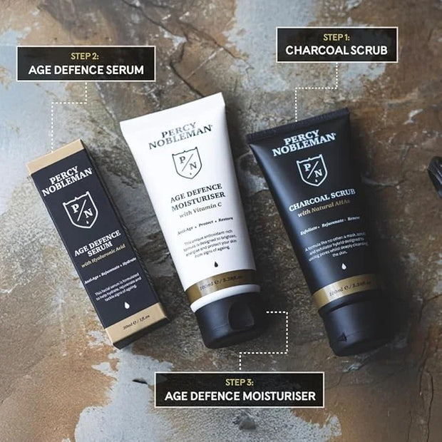 Age Defence Kit, a men's skincare set containing Charcoal Face Scrub (with Natural AHAs), ultra-hydrating Facial Serum (wi...
