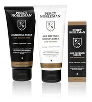 Age Defence Kit, a men's skincare set containing Charcoal Face Scrub (with Natural AHAs), ultra-hydrating Facial Serum (wi...