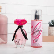 Guess Girl Eau de Toilette 3 Piece Gift Set - Perfume Spray 3.4 Fl. Oz., Travel Spray 0.5 Fl. Oz., & Body Lotion 6.7 Fl. O...