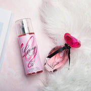 Guess Girl Eau de Toilette 3 Piece Gift Set - Perfume Spray 3.4 Fl. Oz., Travel Spray 0.5 Fl. Oz., & Body Lotion 6.7 Fl. O...